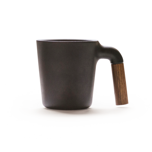 HMM signature product. Unique ceramic with walnut wood mug.