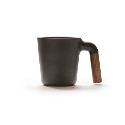 HMM signature ceramic mug with walnut wood. 